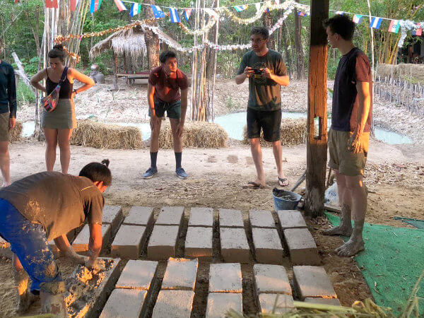 Making adobe bricks for sustainable permaculture building